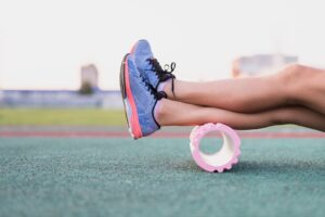 Sportive legs of woman on roller