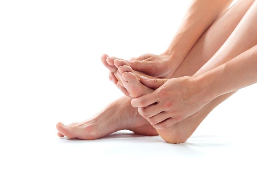 Women Feet on White Background