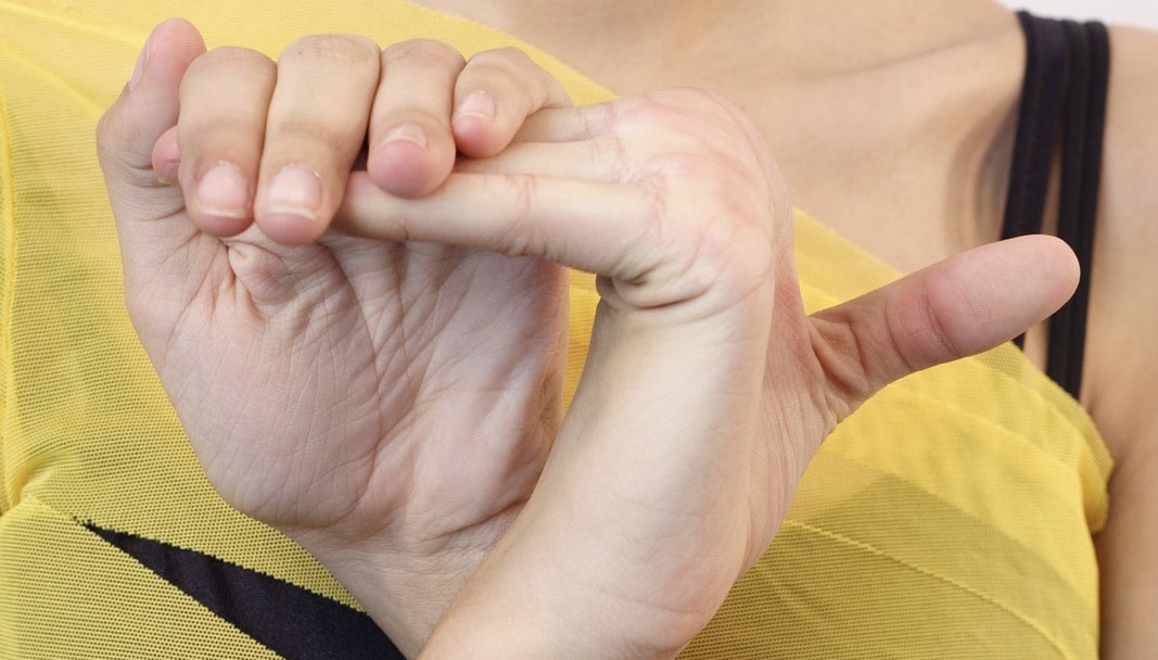 Girl stretching her arm